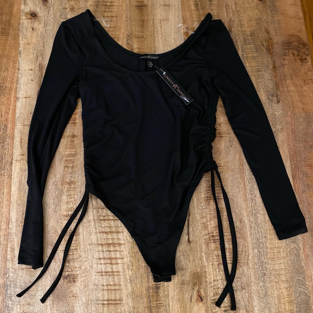 Almost famous black bodysuit high leg with drawstrings ruching on sides NWOT